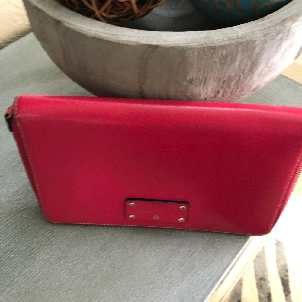 Kate Spade travel wallet 9x5. Worn but beautiful.